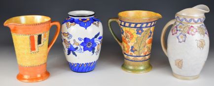 Three Art Deco Crown Ducal / Bursley Ware jugs, two with tube lined decoration, one signed Charlotte