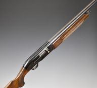 Beretta A301 12 bore three-shot semi-automatic shotgun with engraved locks, chequered semi-pistol
