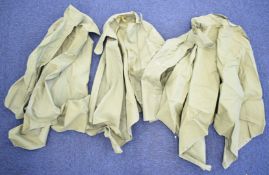 Three British Army Cold War capes, originally for use by the band of the Royal Gloucestershire