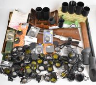 A collection of gun and shooting accessories including scope covers, stocks, Redding re-loading