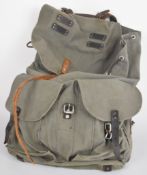 Swedish bergen of canvas construction with leather strapping and alloy buckles