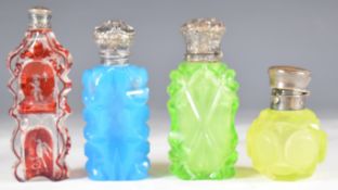 Four 19th / 20thC cut glass scent / perfume bottles, one probably uranium glass, all with hallmarked