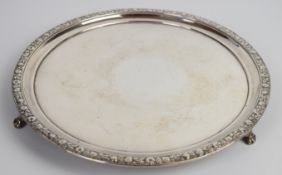William Bateman I Georgian hallmarked silver circular salver with floral border, raised on three
