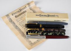 Five fountain pens comprising Conway Stewart 27 and 55, Unique, Osmiroid 65 and Parker 51