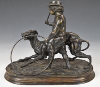 Bronze figure of a boy and dog playing with a hoop, impressed J Moigniez to base, H26cm