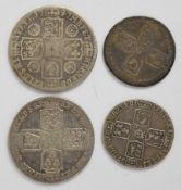 Four George II coins comprising 1749 and 1758 shillings and 1757 and another 1750s sixpence