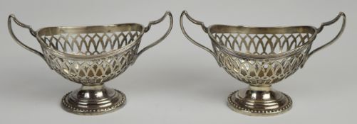 Pair of Victorian hallmarked silver twin handled miniature bon bon dishes or salt holders,