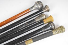 Six hallmarked silver and white metal and horn mounted walking sticks / riding crops, longest 93cm
