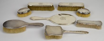 Hallmarked silver dressing table items comprising hand mirror and seven various brushes including