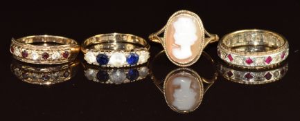 Four 9ct gold rings including garnet, cameo, eternity ring, etc, 9.7g, size N & M