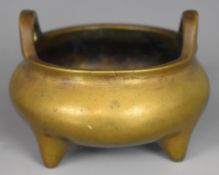 Chinese twin handled bronze censer with six character Xuande mark impressed to the base, 9cm in