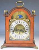 Franz Hermle Holland three train mantel or bracket clock with moonphase, striking on a set of gongs,
