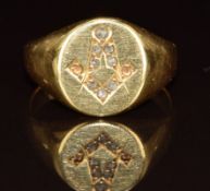 An 18ct gold signet ring set with rose cut diamonds in the form of a Masonic compass, Birmingham