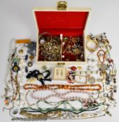 A collection of jewellery including a pair of yellow metal cufflinks set with jadeite, silver