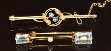 A 9ct gold brooch set with two aquamarines and a pearl (3.8g, 4.5cm) and a 15ct gold brooch set with