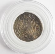 A silver hammered penny struck around the reigns of Henry II or John, short cross reverse