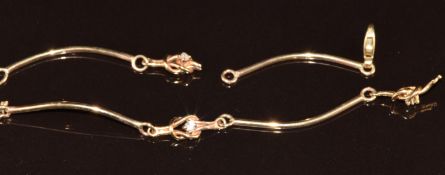 A 9ct gold bracelet set with diamonds (damaged), 5.8g