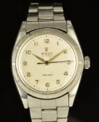 Rolex Oyster Precision gentleman's wristwatch ref. 6427 with gold Arabic numerals, gold and black