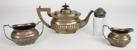 Edward VII hallmarked silver three piece bachelor's tea set with reeded lower body, Birmingham 1904,