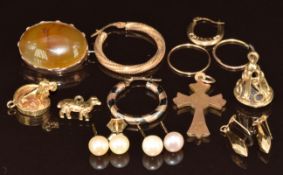 A 9ct gold cross pendant, three pairs of 9ct gold earrings, 9ct gold seal/ fob set with an amethyst,