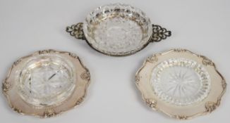 Three hallmarked silver and cut glass butter dishes comprising one Birmingham 1930 and two