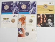 Seven Royal Mint brilliant uncirculated silver coins comprising two 2015 Britannia £50 and £20