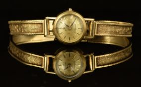 Omega Ladymatic 9ct gold ladies wristwatch with black hands, gold and black hour markers,