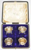 Cased set of four George V hallmarked silver open salts, Birmingham 1912, maker Collingwood & Sons