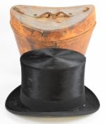 Lincoln Bennett silk top hat in leather case, size 6⅞ or 22⅛ inches