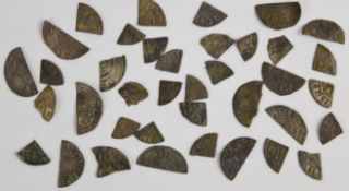 An accumulation of circa 12thC hammered cut half and quarter coins, includes some Scottish examples,