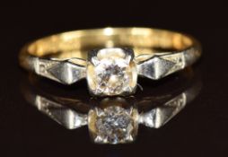 An 18ct gold ring set with a round cut diamond of approximately 0.3ct in a platinum setting, 2.5g,