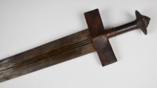 North African Tuareg sword in leather scabbard, L106cm. WE ARE NOT ABLE TO OFFER OUR USUAL POSTAGE