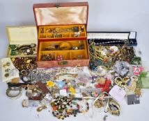 A collection of jewellery including a Sphinx brooch, silver locket, silver chain, Napier necklace,