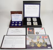 Four historic coin sets comprising Prince Philip coin and stamp collection including set of 1921