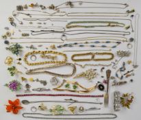 A collection of jewellery including four Exquisite brooches, diamanté bracelet, Napier earrings,