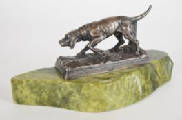 WMF silver plated or similar study of a dog, marked to front WMF, on green marble or similar base,