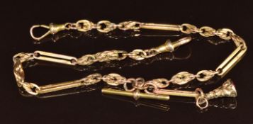 A 9ct gold double Albert / watch chain made up of knotted and elongated links, with yellow metal