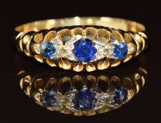 An 18ct gold ring set with three sapphires and two diamonds, 2.4g, size Q
