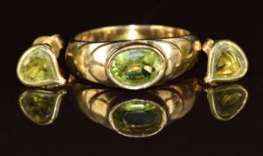 A 9ct gold ring set with a peridot (size N), with a pair of 9ct gold earrings each set with a