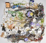 A collection of costume jewellery including necklaces, brooches, earrings, glass beaded, French