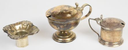Two hallmarked silver mustards and a hallmarked silver sconce, weight of all three 199g
