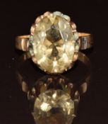 A 9ct gold ring set with an oval cut quartz, 4.4g, size Q