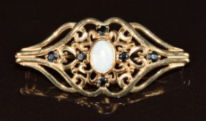 A 9ct gold brooch set with an opal and sapphires, 4.2g, 3.8cm