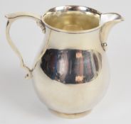 Spink & Son Elizabeth II hallmarked silver jug of baluster form, London 1971, height 10cm, weight