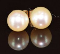 A pair of 9ct gold earrings each set with a pearl, 1.9g