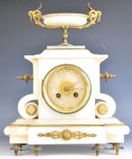 19th century French white alabaster mantel clock with urn finial, the two train movement striking on