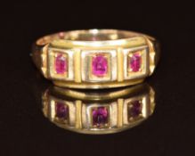 A 15ct gold ring set with three pink sapphires, Chester 1881, 2.4g, size J