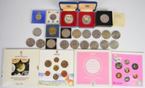 Two Royal Mint silver 1977 proof crowns in cases together with two George V rocking horse crowns,