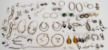 Twenty-three pairs of silver earrings including Navajo, hoops, labradorite, etc and single silver