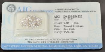 Seventy-seven round brilliant cut light to natural fancy light mixed pink diamonds, each measuring